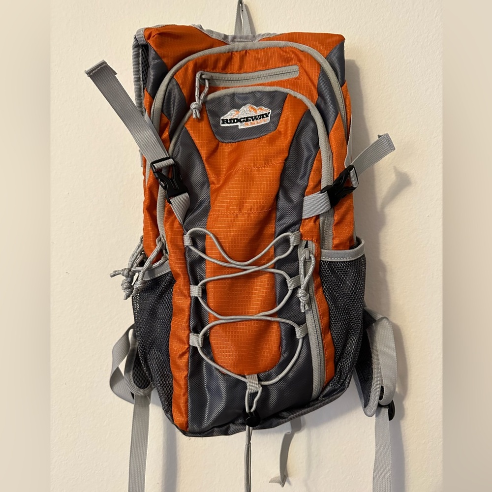 Gently used Kelty Ridgeway Hydration Backpack with 2 liter water pack